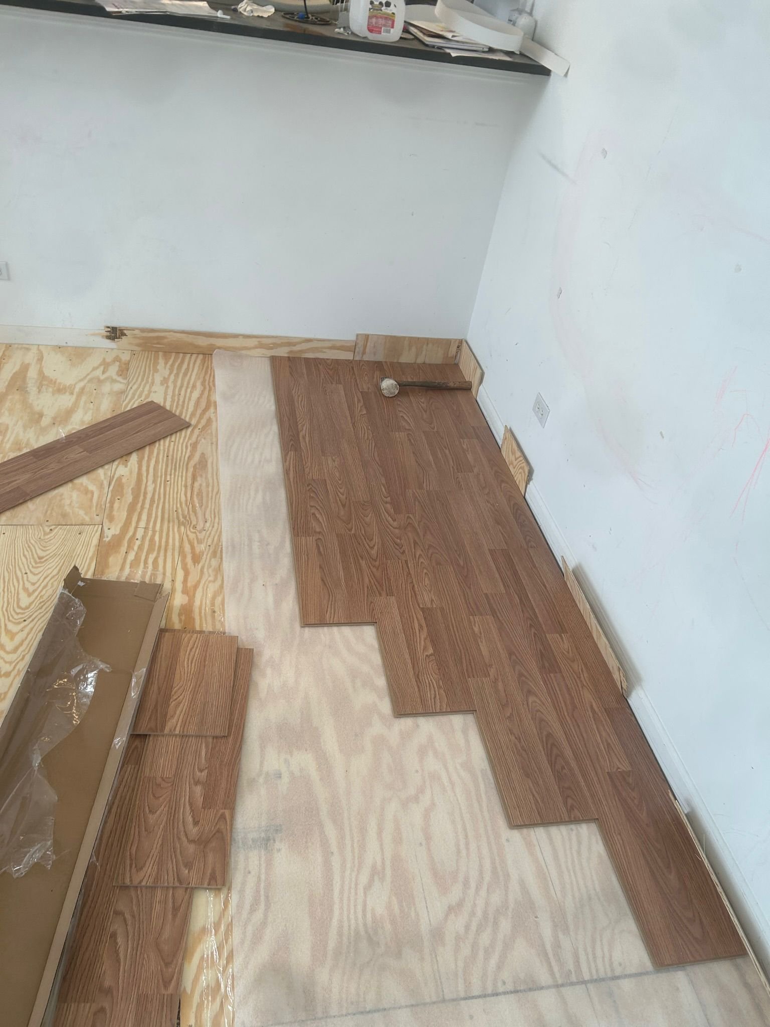 Entryway flooring installation with oak laminate