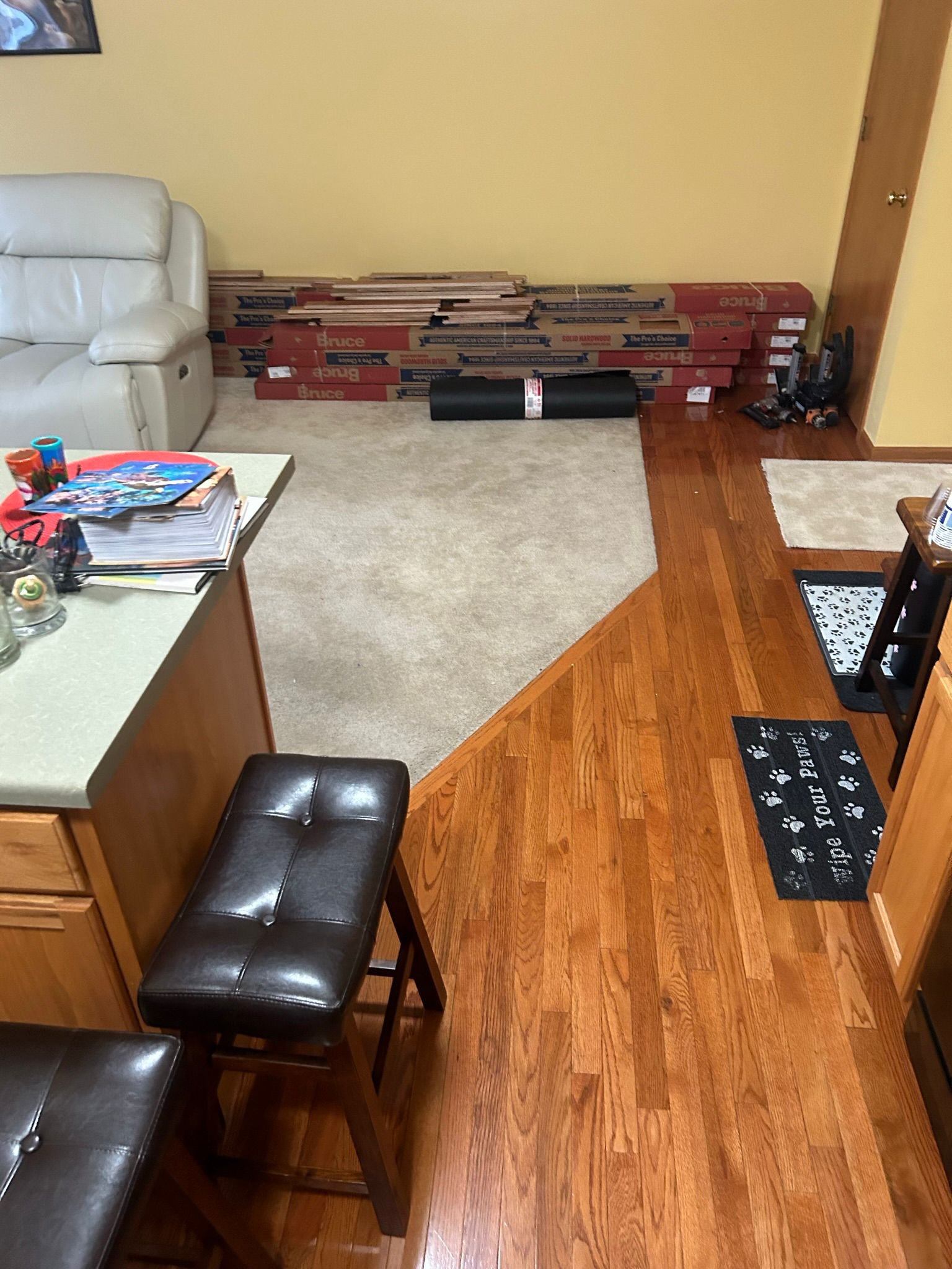 Prefinished hardwood floorboards laid in Illinois condo