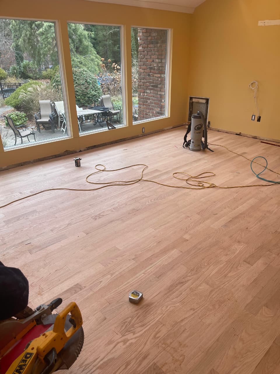 Professional hardwood floor installation in a Rockford, IL home — nail-down oak