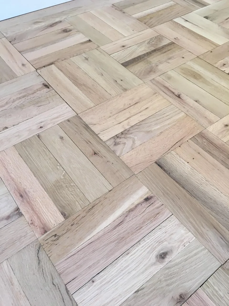 Ramos Wood Floors crew installing hardwood floors in Rockford, IL