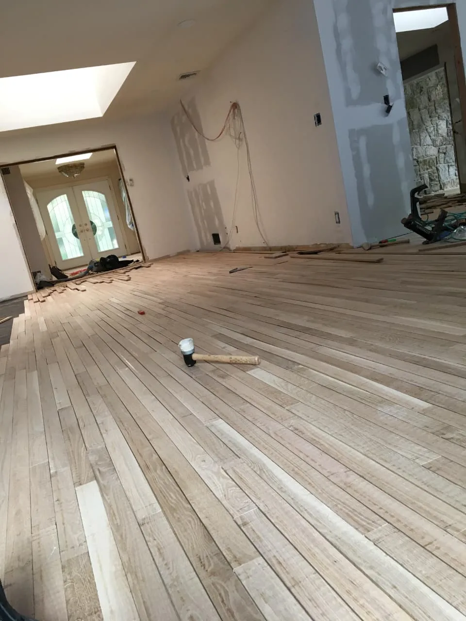 Hardwood floor installation in progress — Ramos Wood Floors Rockford IL