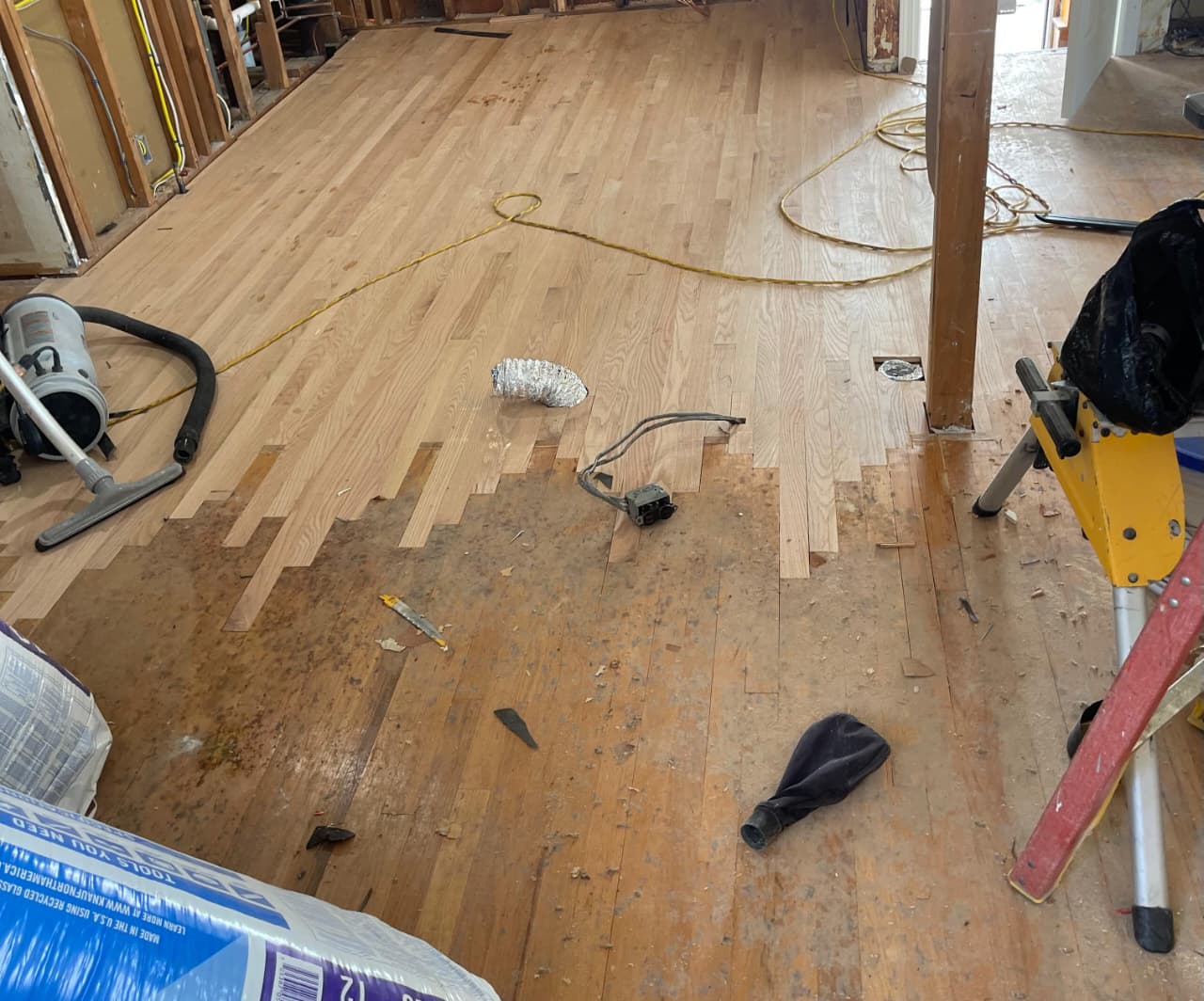 Water damage repair on hardwood floor — Rockford, IL
