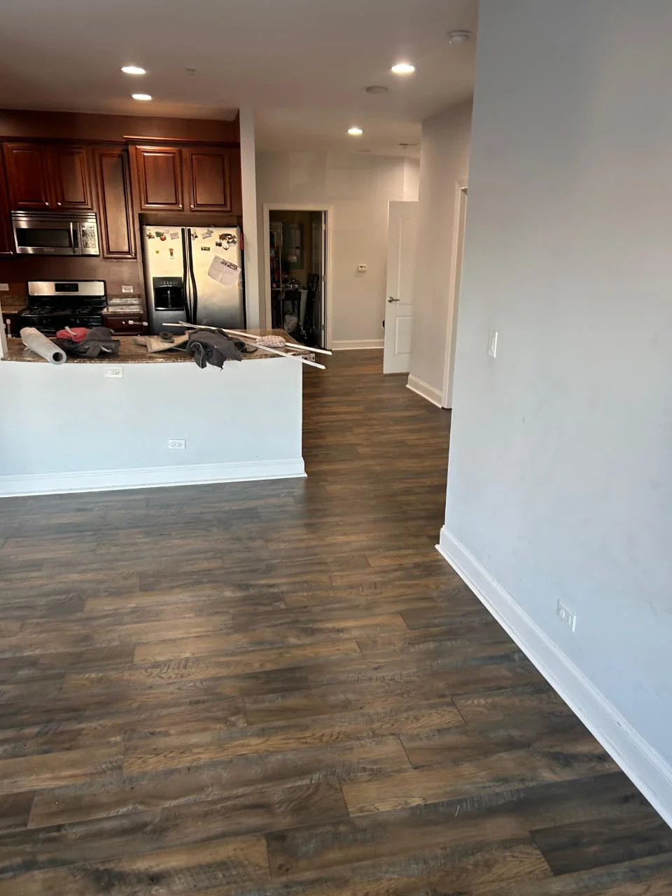 Luxury vinyl plank flooring installation in Rockford, IL — gray wood look LVP