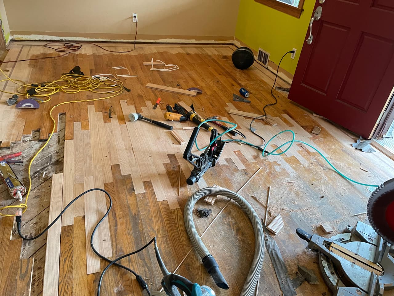Before and after water damage repair on hardwood floors — Loves Park, IL