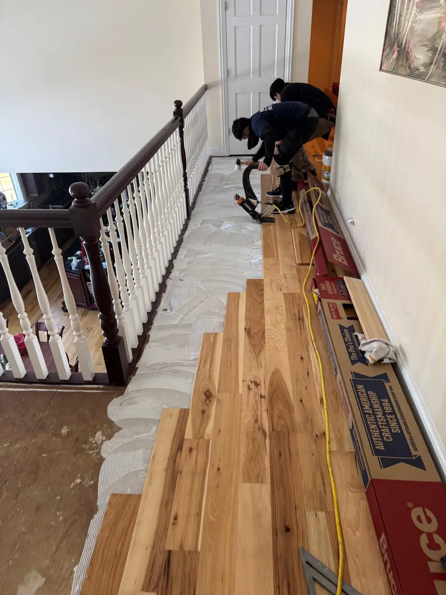 Flooring contractor installing hardwood in Rockford, IL
